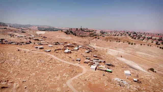 Bedouin Camp Close to Israeli City Maale Adumim Aerial Drone footage over Bedouin outpost Close to Israeli City Maale Adumim Aerial