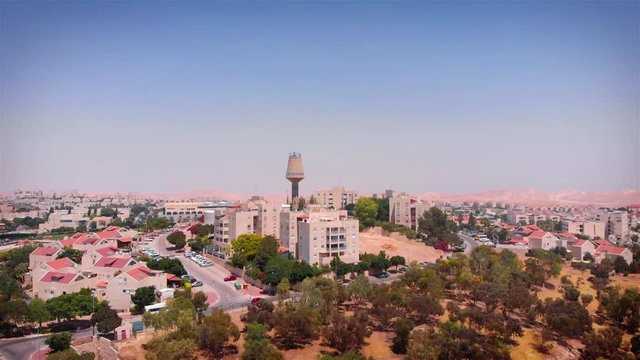 Water Tower in desert City Aerial view Droe footage over Israel City Maale Adumim
