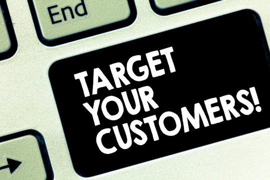 Conceptual hand writing showing Target Your Customers. Business photo text Aim those clients who are most likely to buy from you Keyboard key Intention to create computer message idea