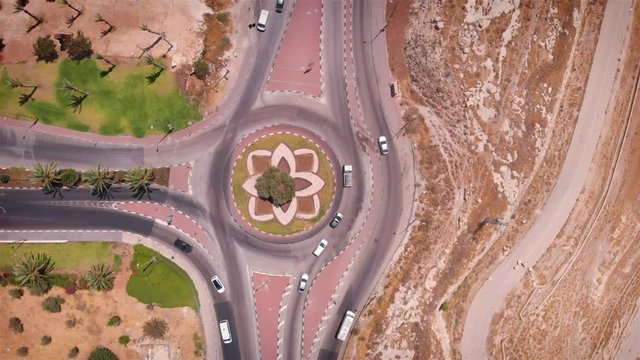Traffic roundabout in the desert Aerial Drone shot over Traffic roundabout in the desert 