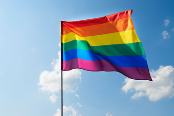 Waving rainbow flag in the sky