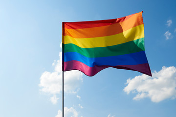 Shot of waving rainbow flag outside