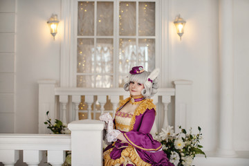Girl in barocco baroque rococo old vintage dress and wig, cosplay costume of 15 16 17 18 19 century