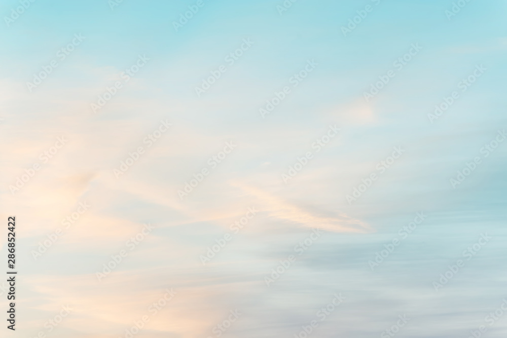 Canvas Prints sunset background. sky with soft and blur pastel colored clouds. gradient cloud on the beach resort.
