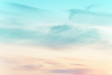 sunset background. sky with soft and blur pastel colored clouds.  gradient cloud on the beach resort. nature. sunrise.  peaceful morning. Instagram toned style