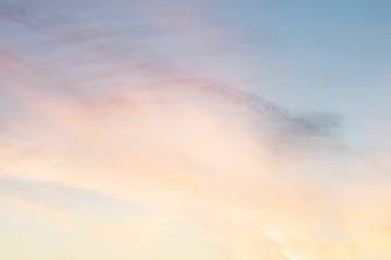 sunset background. sky with soft and blur pastel colored clouds.  gradient cloud on the beach resort. nature. sunrise.  peaceful morning. Instagram toned style