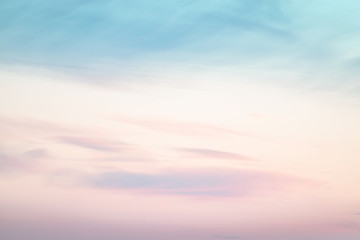 sunset background. sky with soft and blur pastel colored clouds.  gradient cloud on the beach resort. nature. sunrise.  peaceful morning. Instagram toned style