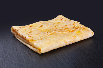 Pancake on a black background