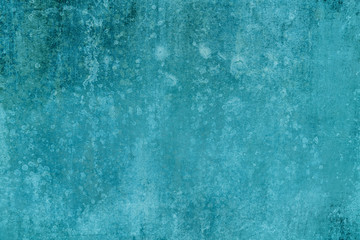 Distressed blue turquoise grungy wall background