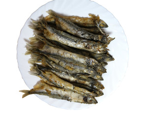 capelin, fried fish on a plate