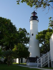 Full view of the Key West lighthouse, a historical attraction in Key West, Florida.
