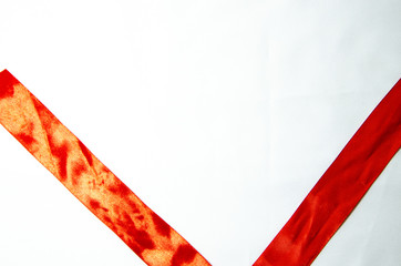 red ribbon on a white background