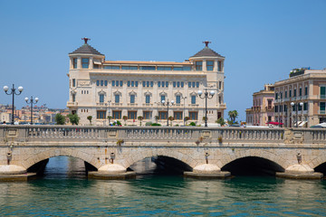 Amazing view of the harbor and bridge of Ortigia Island.
