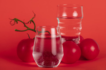 Water glasses and tomatoes arrangement
