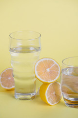 High angle lemons on yellow background