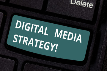 Text sign showing Digital Media Strategy. Conceptual photo plan for maximizing the business benefits of assets Keyboard key Intention to create computer message pressing keypad idea