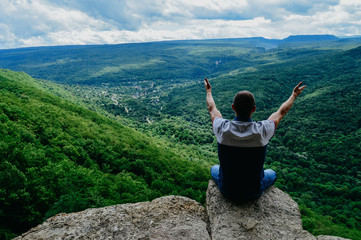 Obraz premium man on top of mountain