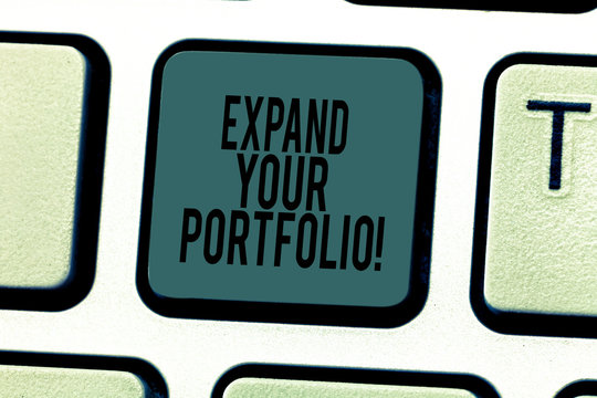 Conceptual hand writing showing Expand Your Portfolio. Business photo text Define the new company s is goals and success metrics Keyboard key Intention to create computer message idea