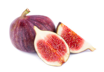 Fresh purple fig fruit isolated on white background. Ripe fig fruit.