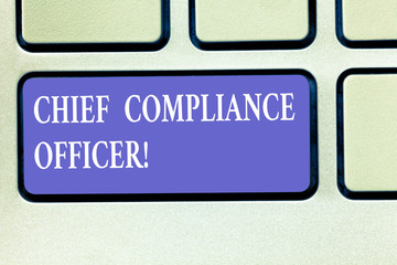 Text sign showing Chief Compliance Officer. Conceptual photo oversees the Corporate Compliance Program Keyboard key Intention to create computer message pressing keypad idea