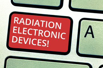 Text sign showing Radiation Electronic Devices. Conceptual photo radio frequency emitted by electronic devices Keyboard key Intention to create computer message pressing keypad idea