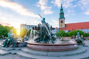 Neptune fountain (Neptunbrunnen) on Alexanderplatz at sunset, Berlin, Germany © Mistervlad