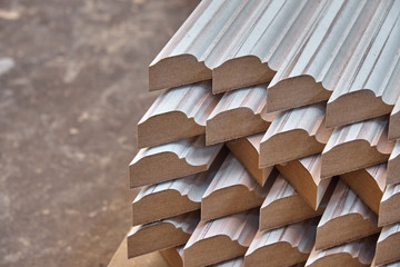 Joinery. Wood door manufacturing process. Stacked door moldings. Furniture manufacture.