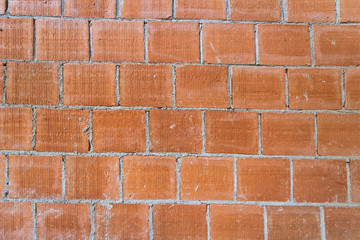 Plank of bricks being built on a building site