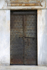 Old rusty metal door