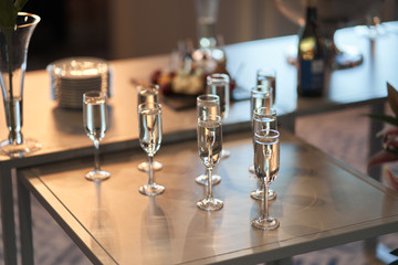 Fototapeta na wymiar glass goblets with champagne. wedding ceremony, new year