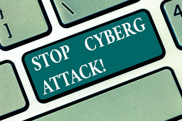 Writing note showing Stop Cyber Attack. Business photo showcasing prevent attempt by hackers damage destroy computer network Keyboard key Intention to create computer message pressing keypad idea
