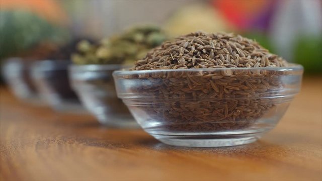 Zoom in shot of Indian spices kept in the bowl. 