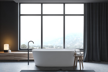 Dark gray bathroom, tub and window