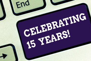 Handwriting text Celebrating 15 Years. Concept meaning Commemorating a special day after 15 years anniversary Keyboard key Intention to create computer message pressing keypad idea