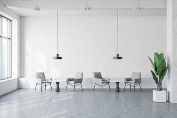 White industrial style office lounge area