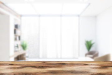 Blurred white and wooden office with lounge