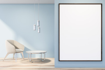 Fototapeta premium Blue living room with armchair and poster