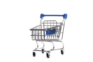 Empty metal shopping trolley isolated on white