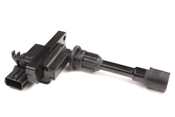 Ignition coil with a japanese car, on a white background. In isolation.