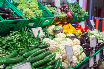 big choice of fresh fruits and vegetables on market counter