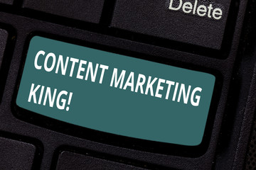 Text sign showing Content Marketing King. Conceptual photo Content is central to the success of a website Keyboard key Intention to create computer message pressing keypad idea