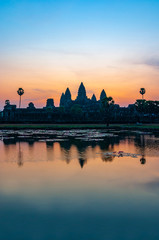 Fototapeta na wymiar Vertical photograph of the Khmer archaeology complex of Angkor Wat at sunrise, Siem Reap, Cambodia.