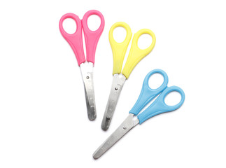 set of different color scissors isolated on a white background.