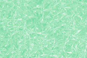 Green leafy texture, background from green plants.Toned in green.Soft focus