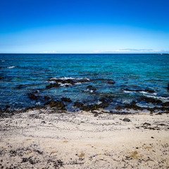 Perfect calm blue view of the ocean near Anaehoomalu Bay Hawaii