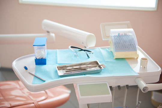 Stomatological instruments on table in dental room