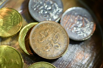 Close up euro coins in the glass bottle.