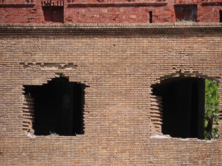 Medium close up of brick windows of Fort Jefferson at the Dry Tortugas National Park in Florida.