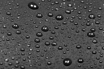 abstract water drops on a dark black  background