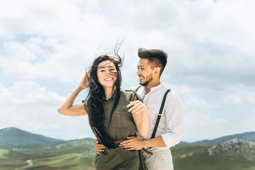 Young beautiful couple hugging and fooling around and spending time together.